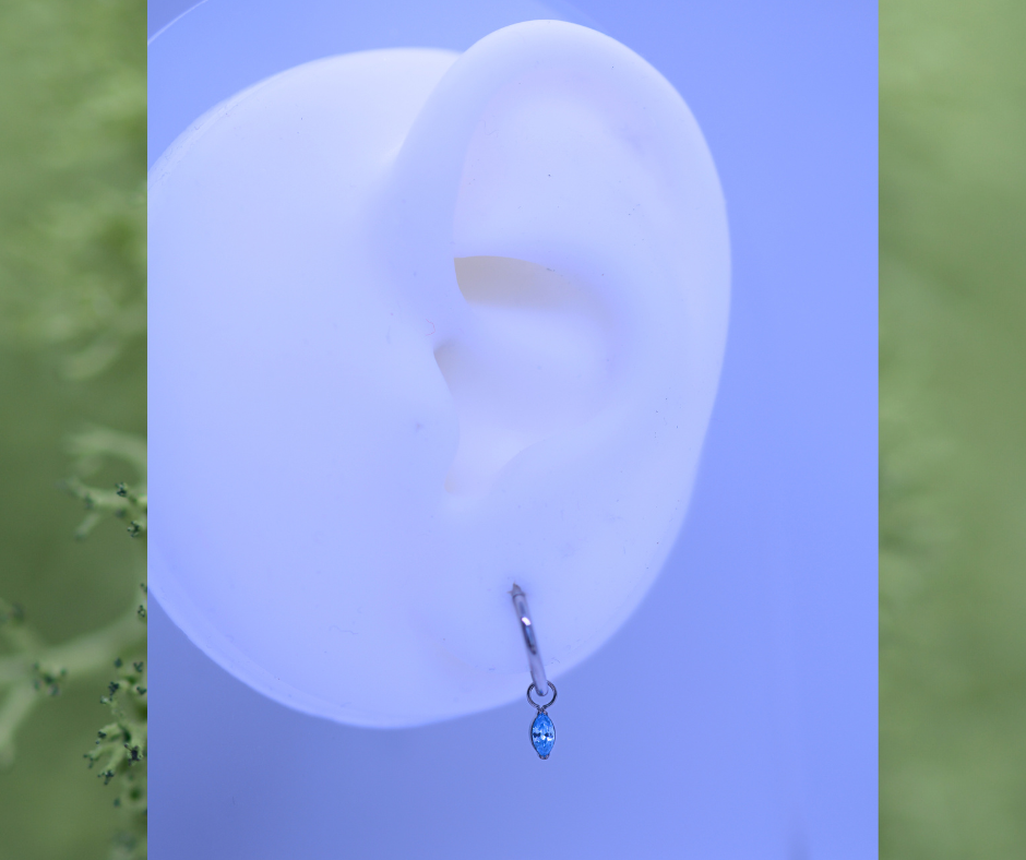 Charm Oval Albastru auriu